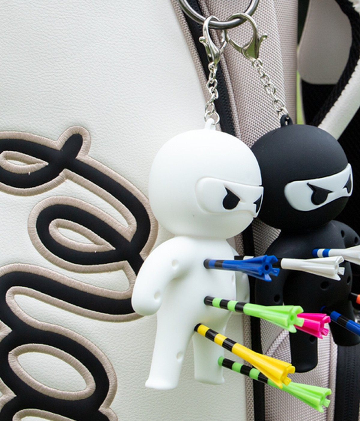 Ninja Charms styled on an everyday bag as playful accessories